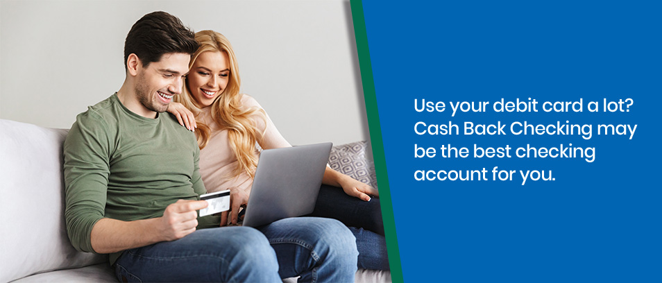 Use your debit card a lot? Cash Back Checking may be the best checking account for you - Couple holding a debit card and looking at a laptop